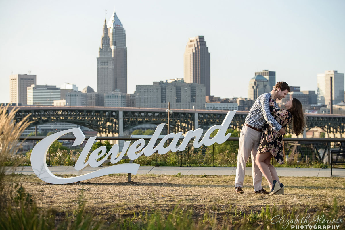 Summer engagement session by the Cleveland sign in Tremont Cleveland Ohio